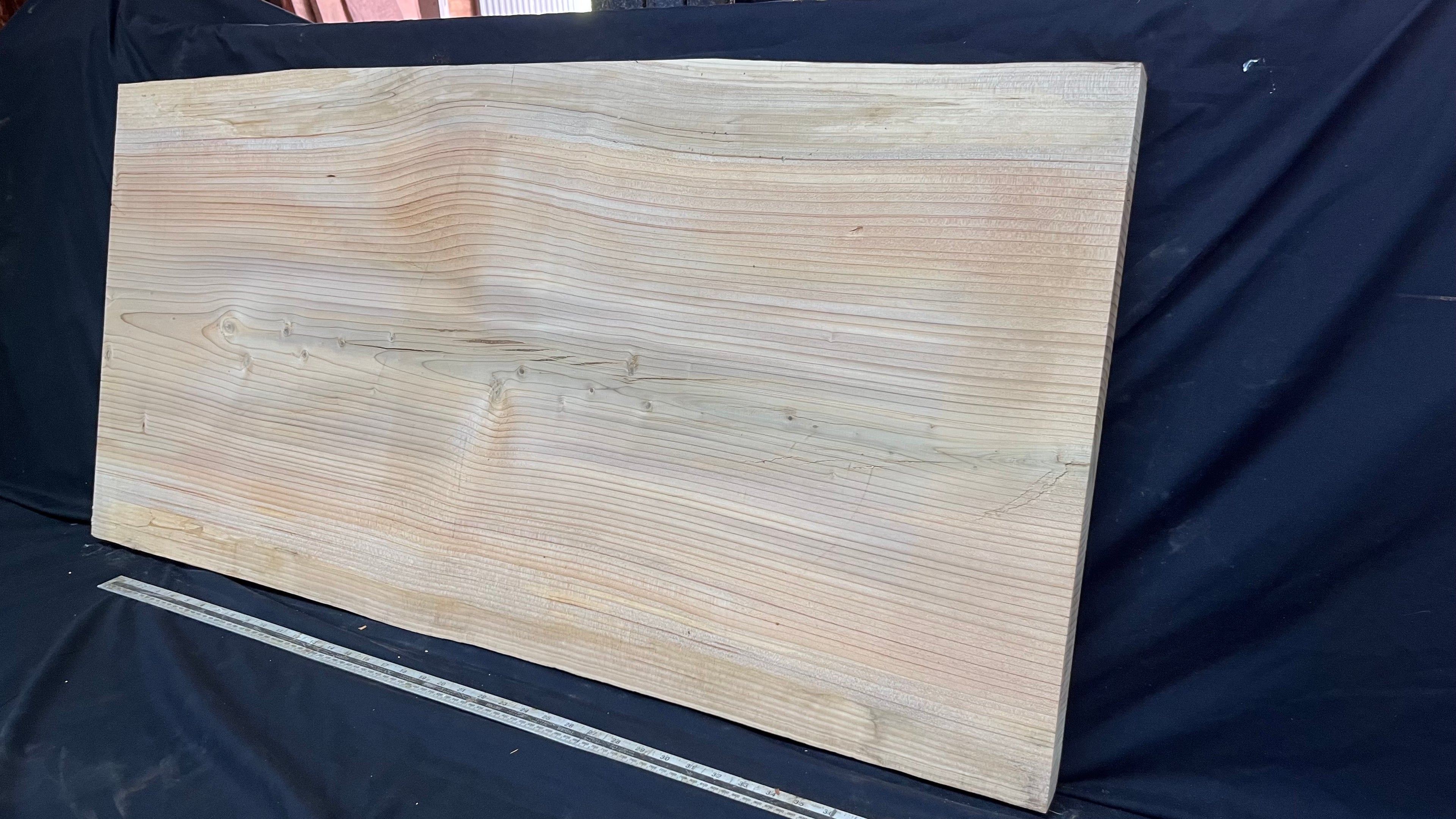 Cedar plank, timber, board, coffee table top. 1174 L x 579 W x 38 D mm  (438mf)