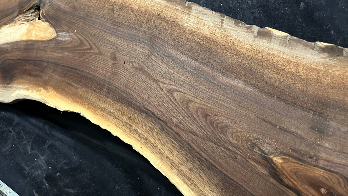 Black walnut tone wood, thin 1007 L x 255 W x 15 D mm    (672)