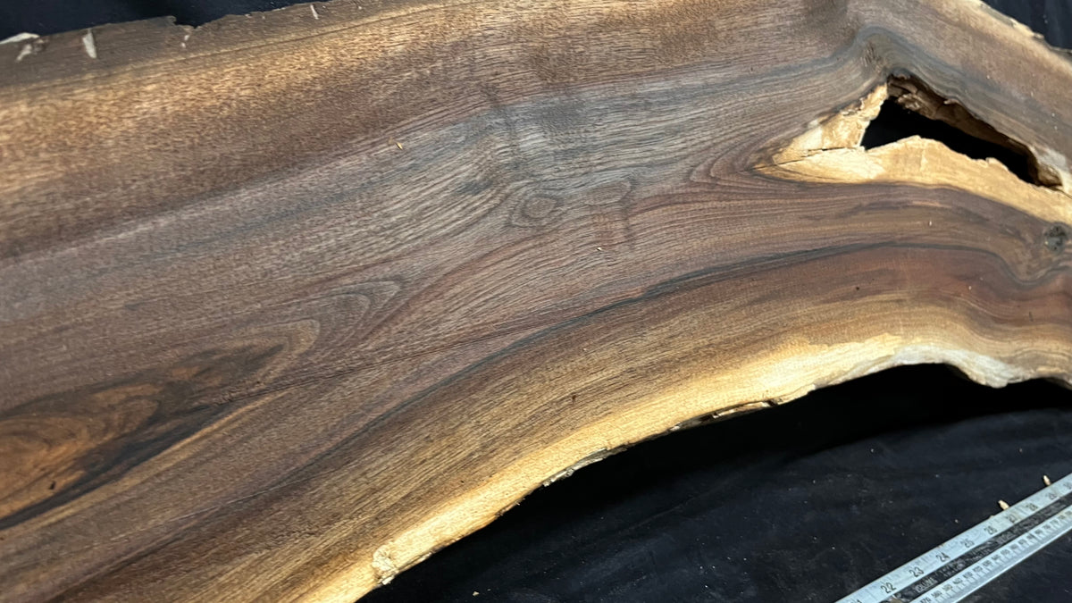 Black walnut tone wood, thin 1007 L x 264 W x 17 D mm    (673)