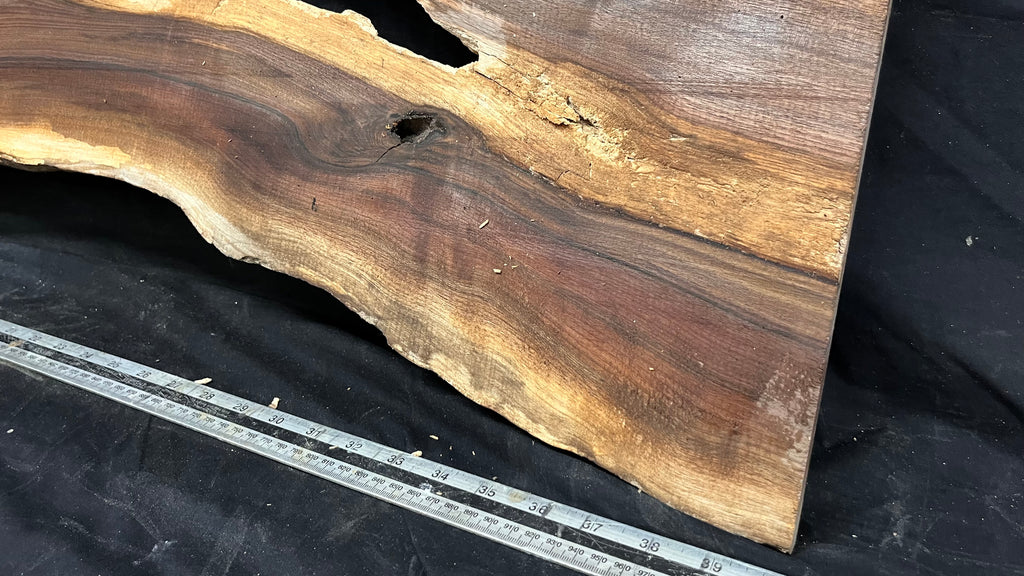 Black walnut tone wood, thin 1007 L x 264 W x 17 D mm    (673)