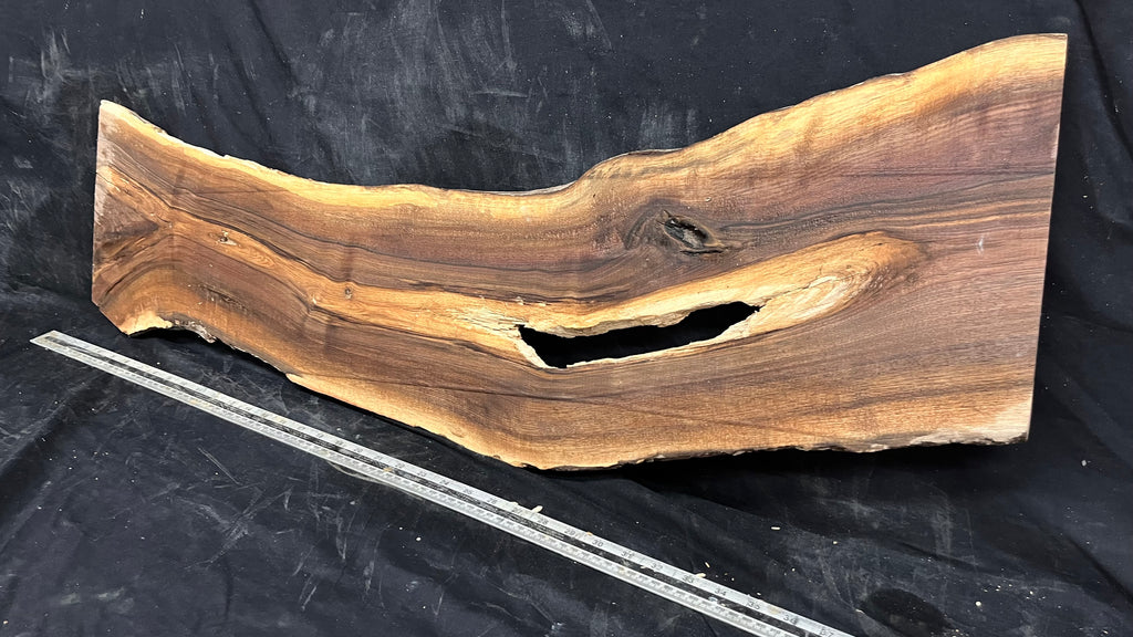 Black walnut tone wood, thin 1007 L x 264 W x 17 D mm    (673)