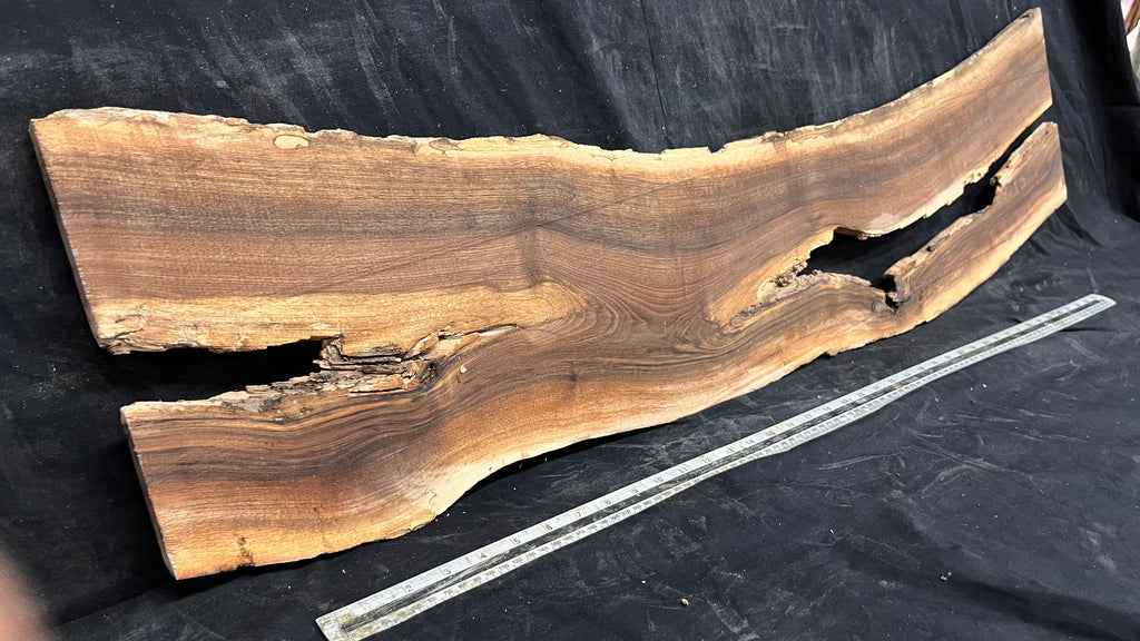 Black walnut tone wood, thin 1164 L x 250 W x 17 D mm    (675)