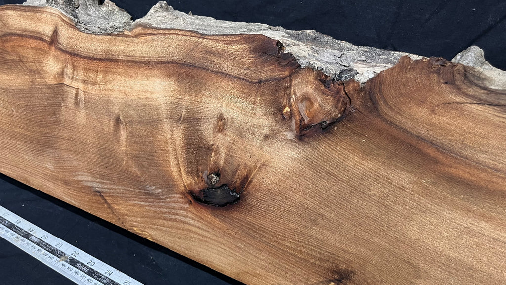 Elm mantle piece, natural edge 1230 L x 245 W x 61 D mm    (711)