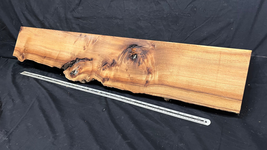 Elm mantle piece, natural edge 1230 L x 245 W x 61 D mm    (711)