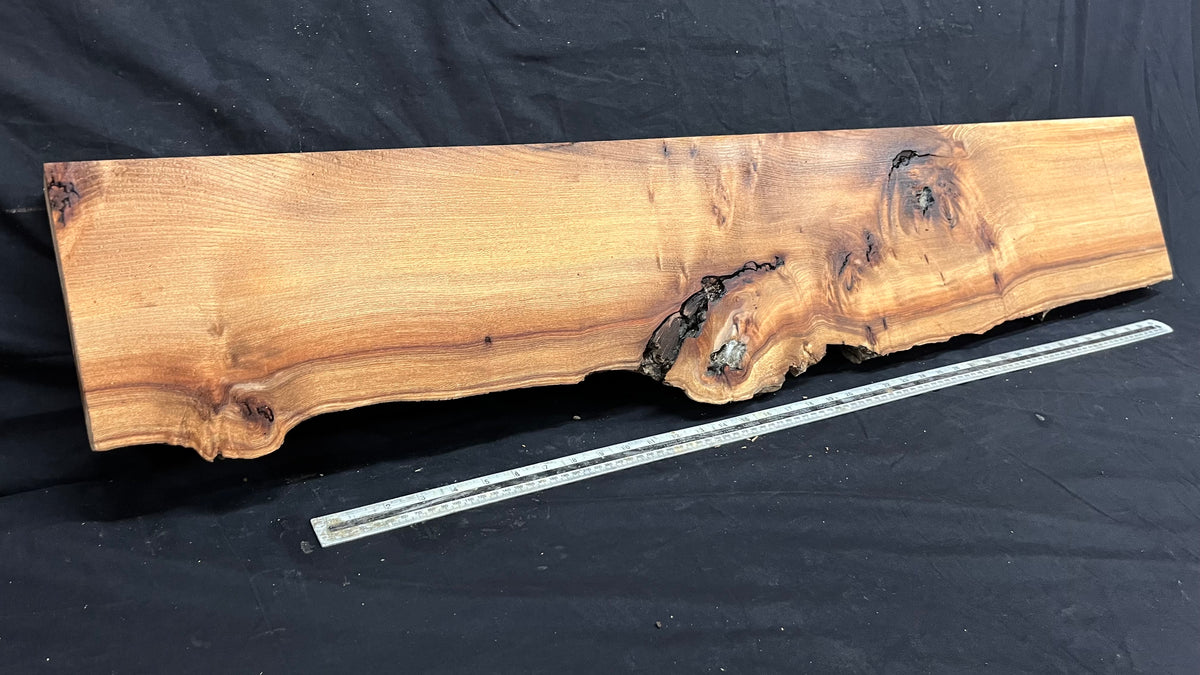 Elm mantle piece, natural edge 1230 L x 245 W x 61 D mm    (711)