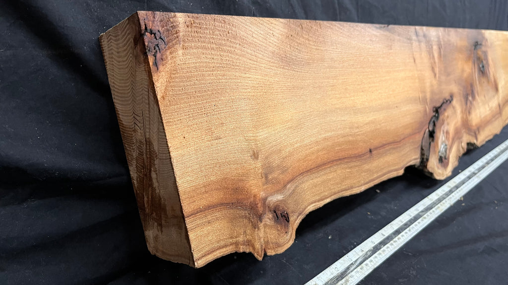 Elm mantle piece, natural edge 1230 L x 245 W x 61 D mm    (711)