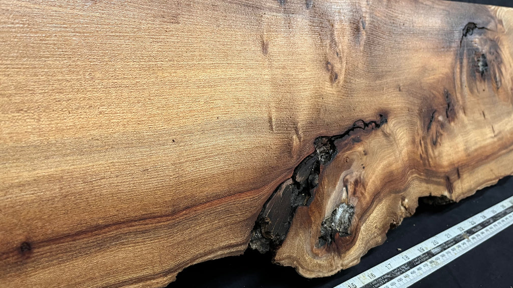 Elm mantle piece, natural edge 1230 L x 245 W x 61 D mm    (711)