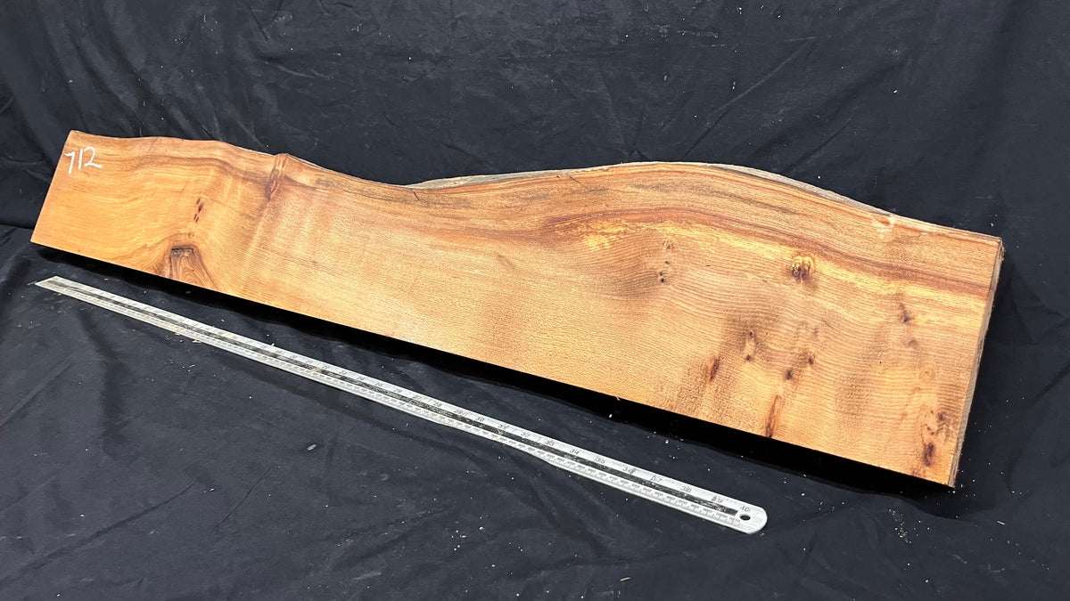 Elm mantle piece, natural edge 1230 L x 234 W x 55 D mm    (712)