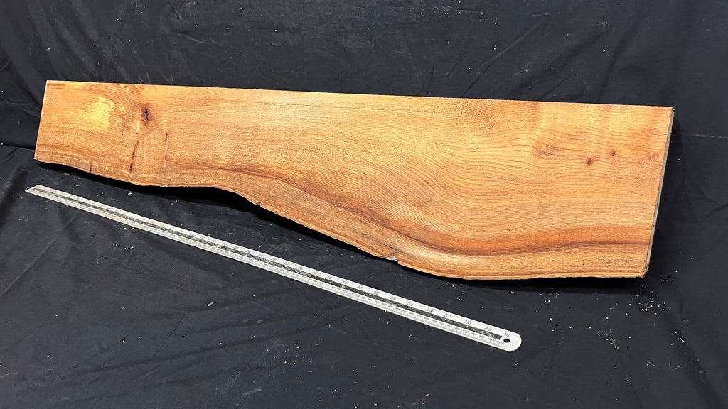 Elm mantle piece, natural edge 1230 L x 234 W x 55 D mm    (712)