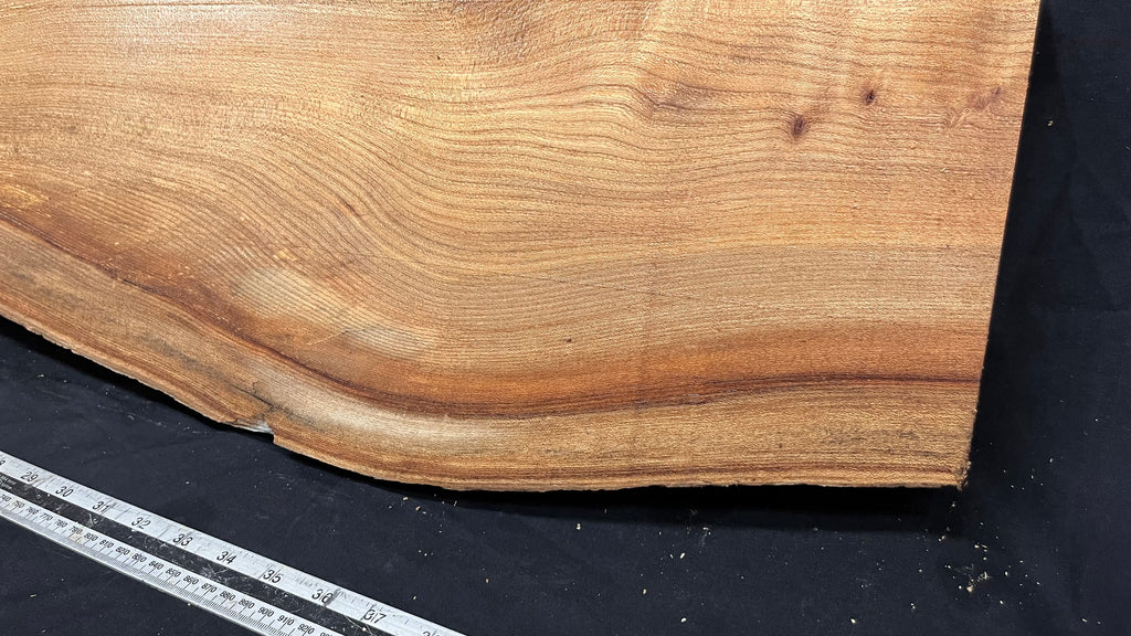 Elm mantle piece, natural edge 1230 L x 234 W x 55 D mm    (712)