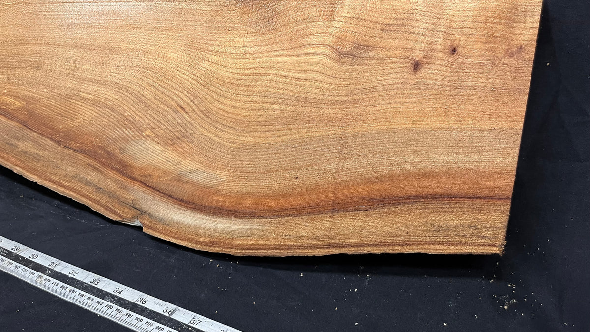 Elm mantle piece, natural edge 1230 L x 234 W x 55 D mm    (712)