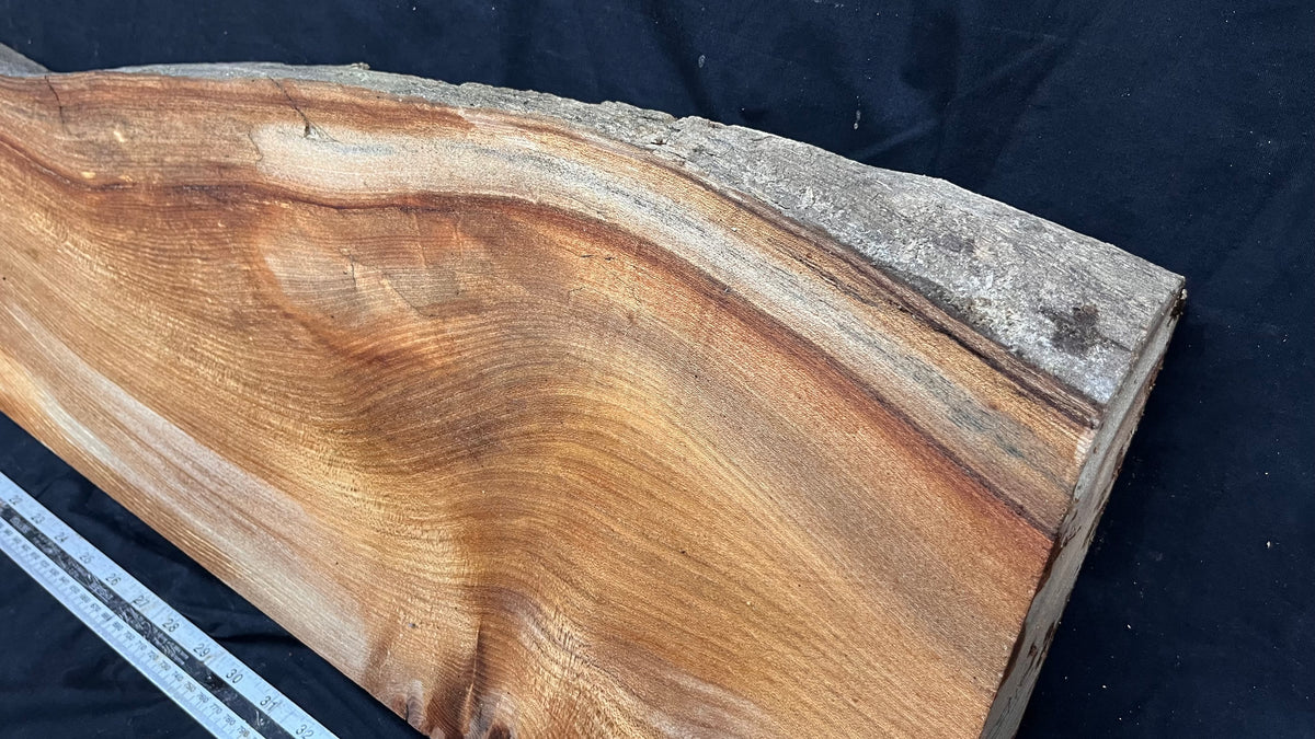 Elm mantle piece, natural edge 1101 L x 247 W x 68 D mm    (716)