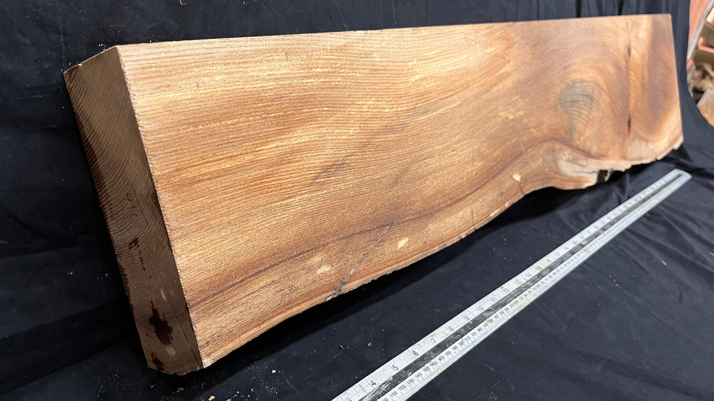 Elm mantle piece, natural edge 1101 L x 247 W x 68 D mm    (716)