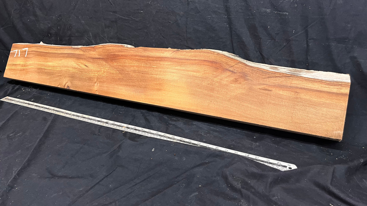 Elm mantle piece, natural edge 1228 L x 202 W x 58 D mm    (717)