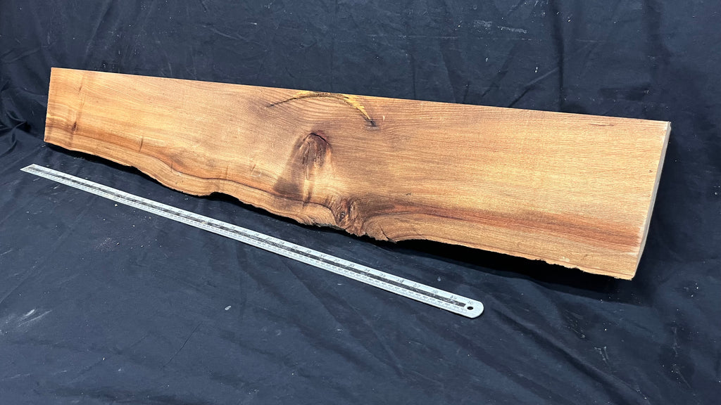 Elm mantle piece, natural edge 1228 L x 202 W x 58 D mm    (717)
