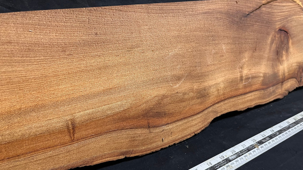 Elm mantle piece, natural edge 1228 L x 202 W x 58 D mm    (717)