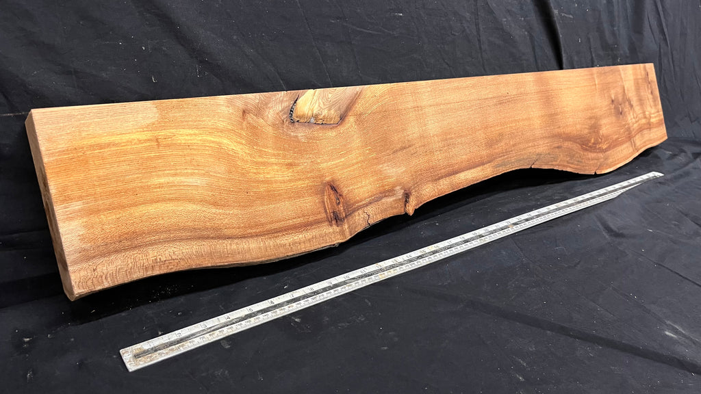 Elm mantle piece, natural edge 1195 L x 203 W x 60 D mm    (719)