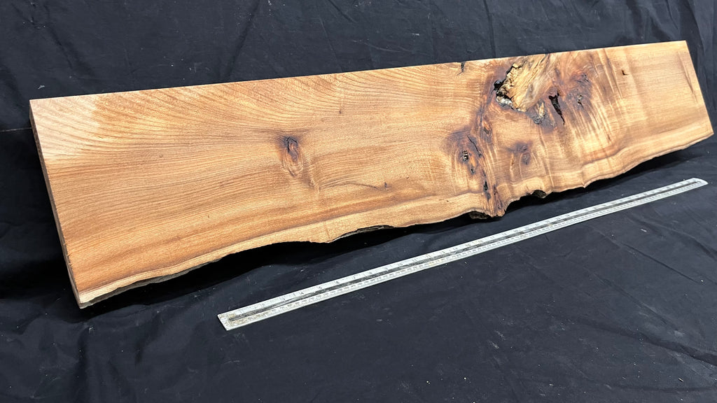 Elm mantle piece, natural edge 1311 L x 257 W x 60 D mm    (721)