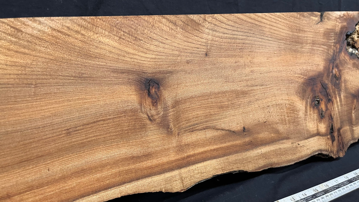 Elm mantle piece, natural edge 1311 L x 257 W x 60 D mm    (721)