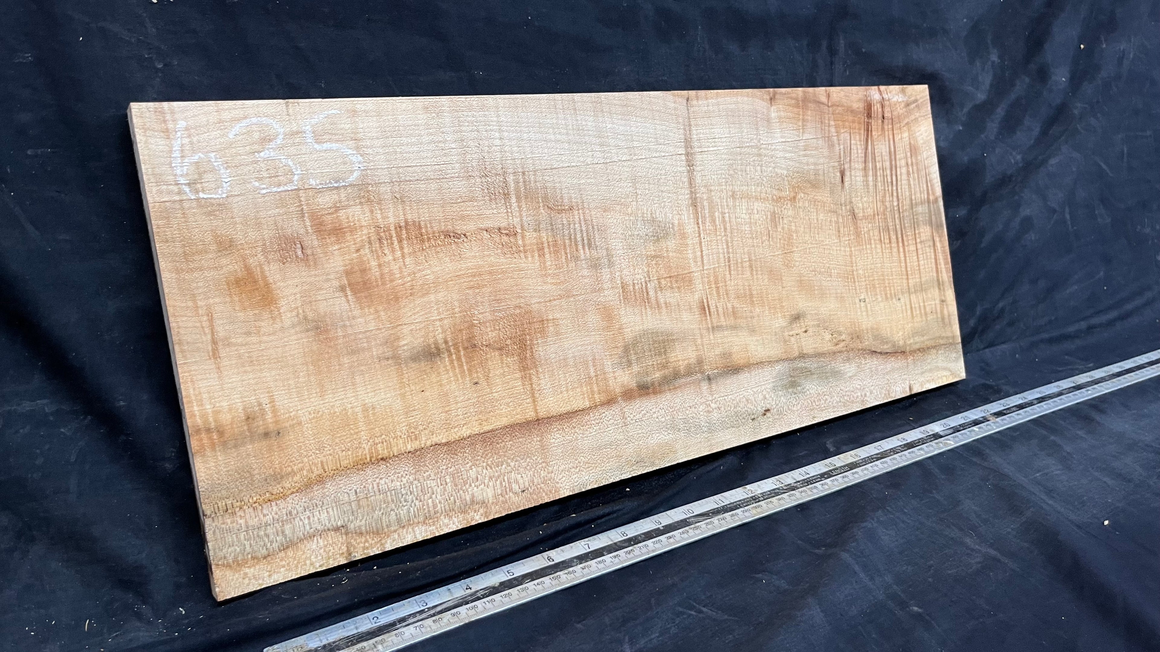 Rippled sycamore tone wood, guitar drop top 599 L x 248 W x 18 D mm     (635)