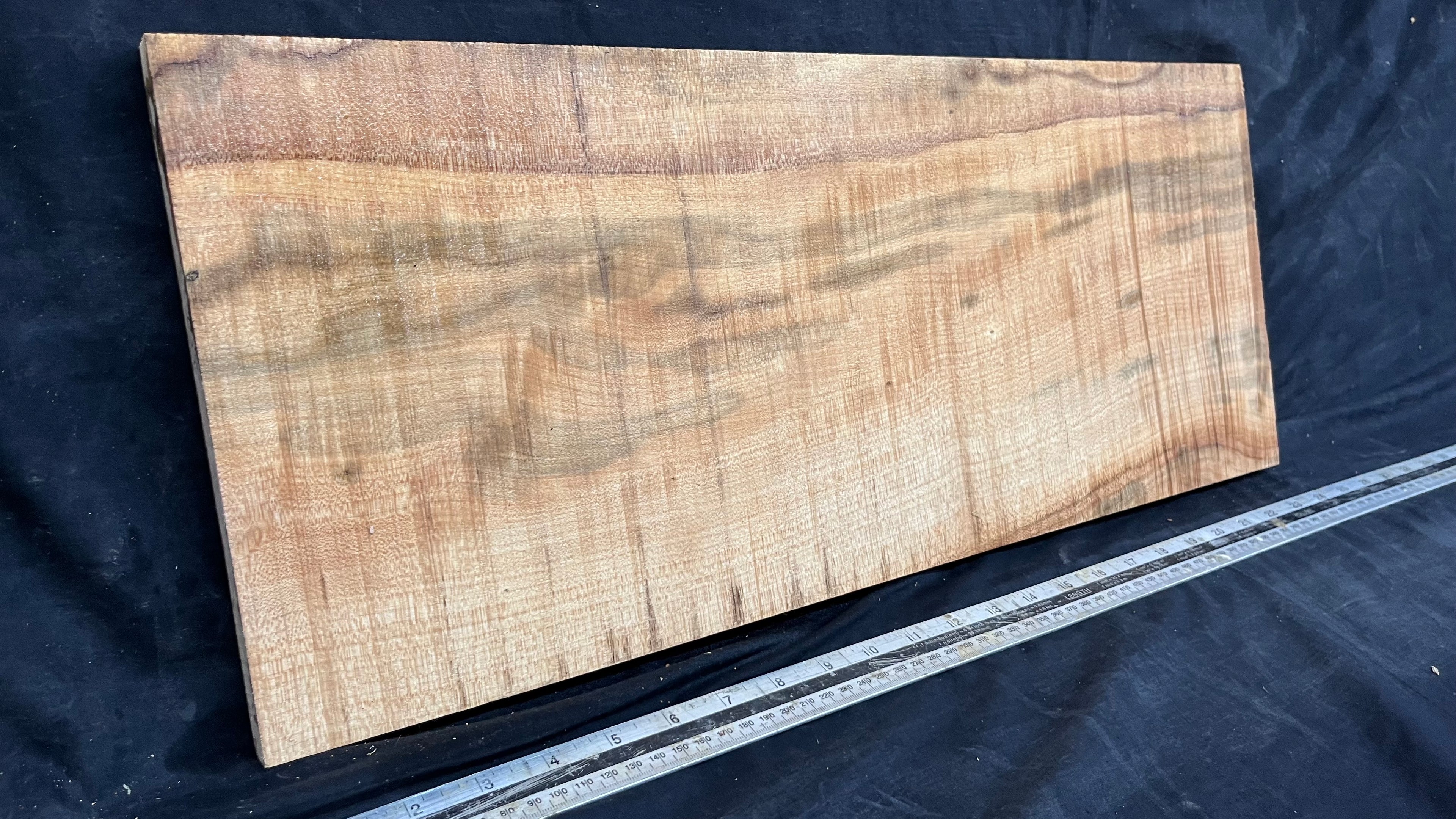 Rippled sycamore tone wood, guitar drop top 599 L x 248 W x 18 D mm     (635)