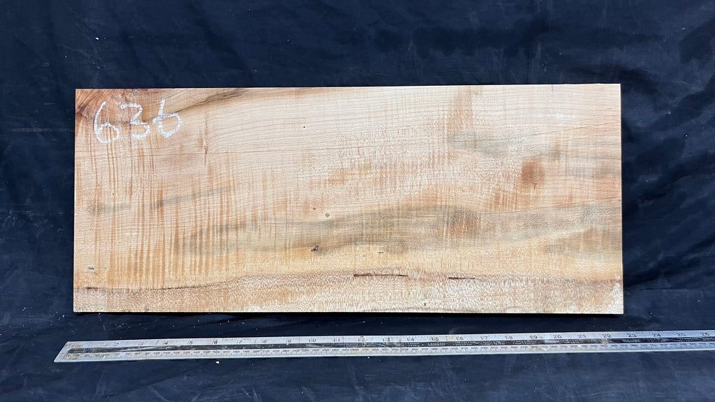 Rippled sycamore tone wood, guitar drop top 598 L x 247 W x 20 D mm     (636)