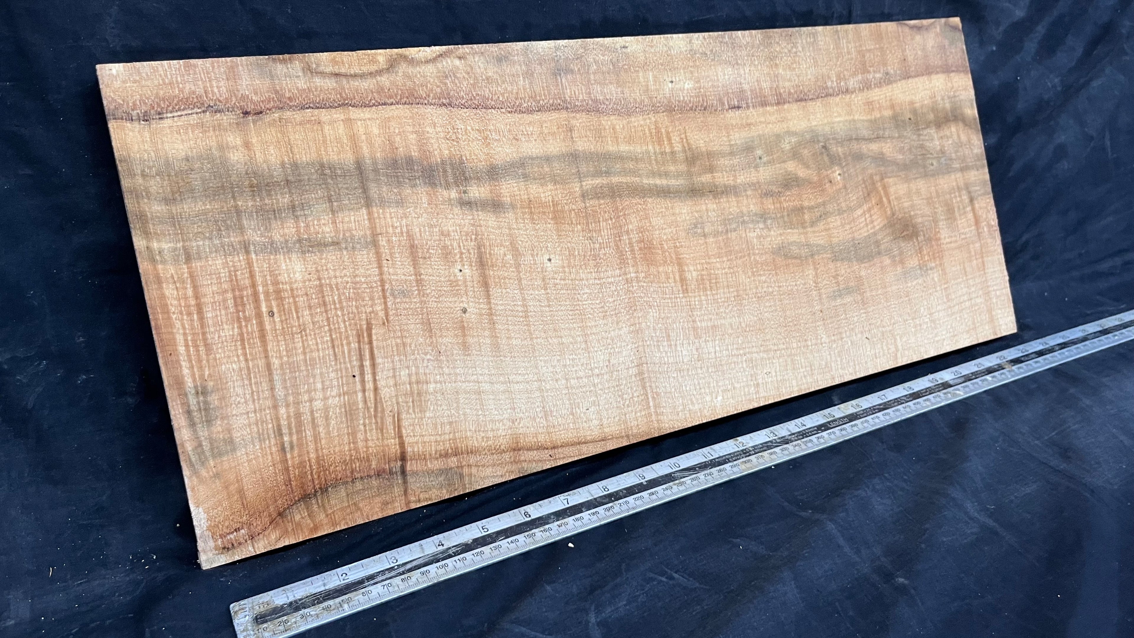 Rippled sycamore tone wood, guitar drop top 598 L x 247 W x 20 D mm     (636)