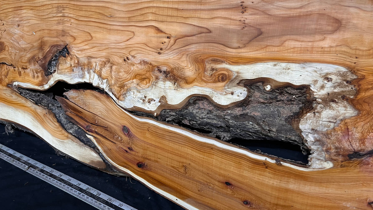 Coffee table top, yew, slab, board 1306 L x 450 W x 25 D mm    (775)