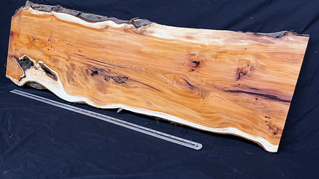 Coffee table top, yew, slab, board 1317 L x 405 W x 26 D mm    (776)
