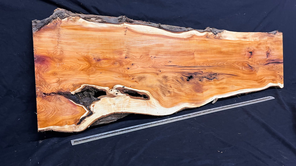 Coffee table top, yew, slab, board 1317 L x 405 W x 26 D mm    (776)